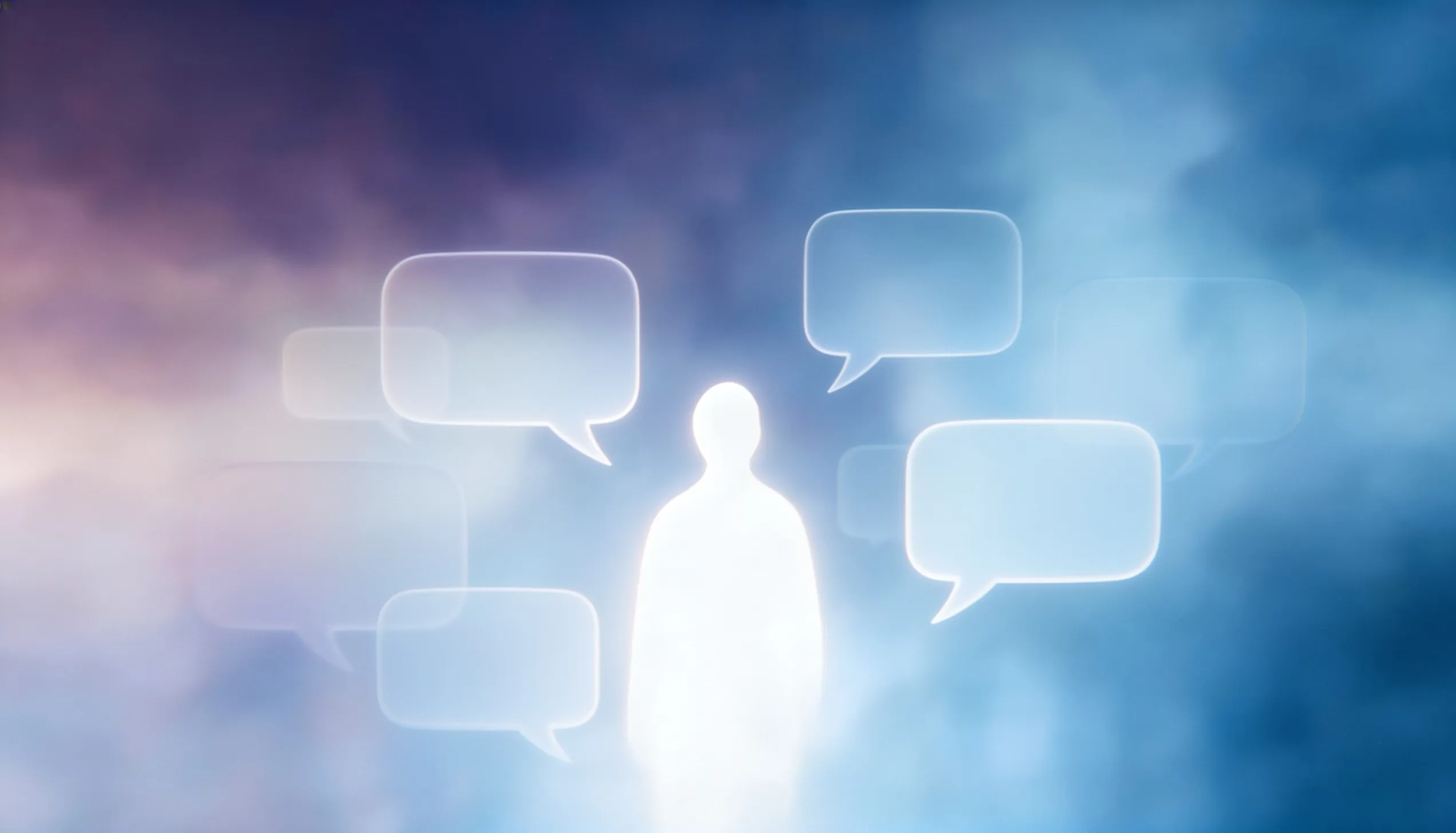 A glowing human silhouette surrounded by translucent conversation bubbles
